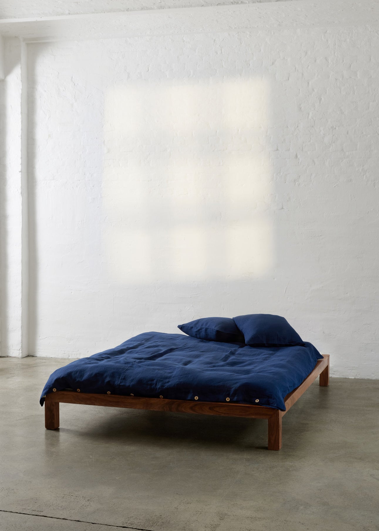 Linuhn linen bedding sheets in Baltic navy blue natural fabric organic and ethically made